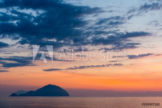 Bild på Beautiful colorful Filicudi and Alicudi eolian islands view at sunset in summer from Pollara in Salina island